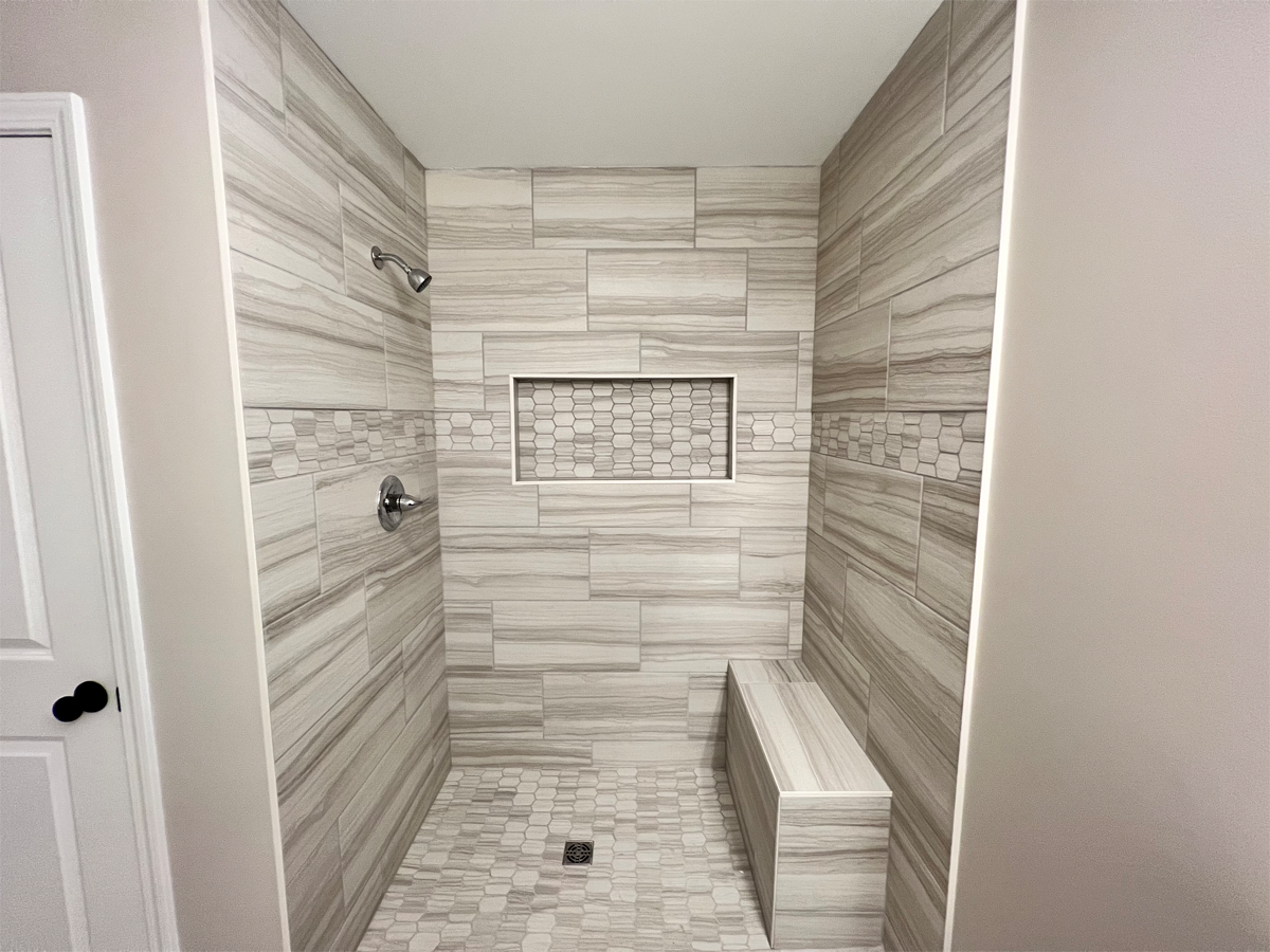 The Franklin master bathroom tile shower