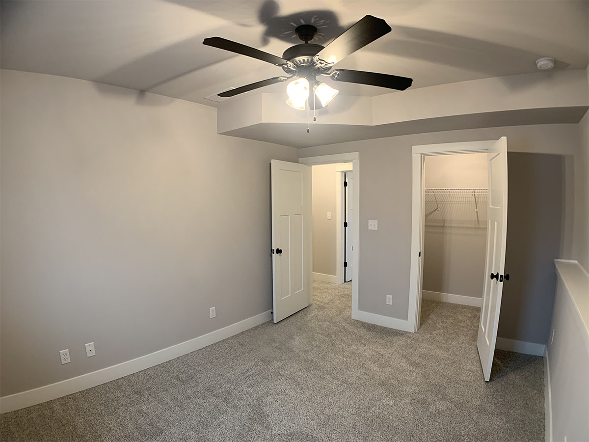 Lower level second bedroom with closet