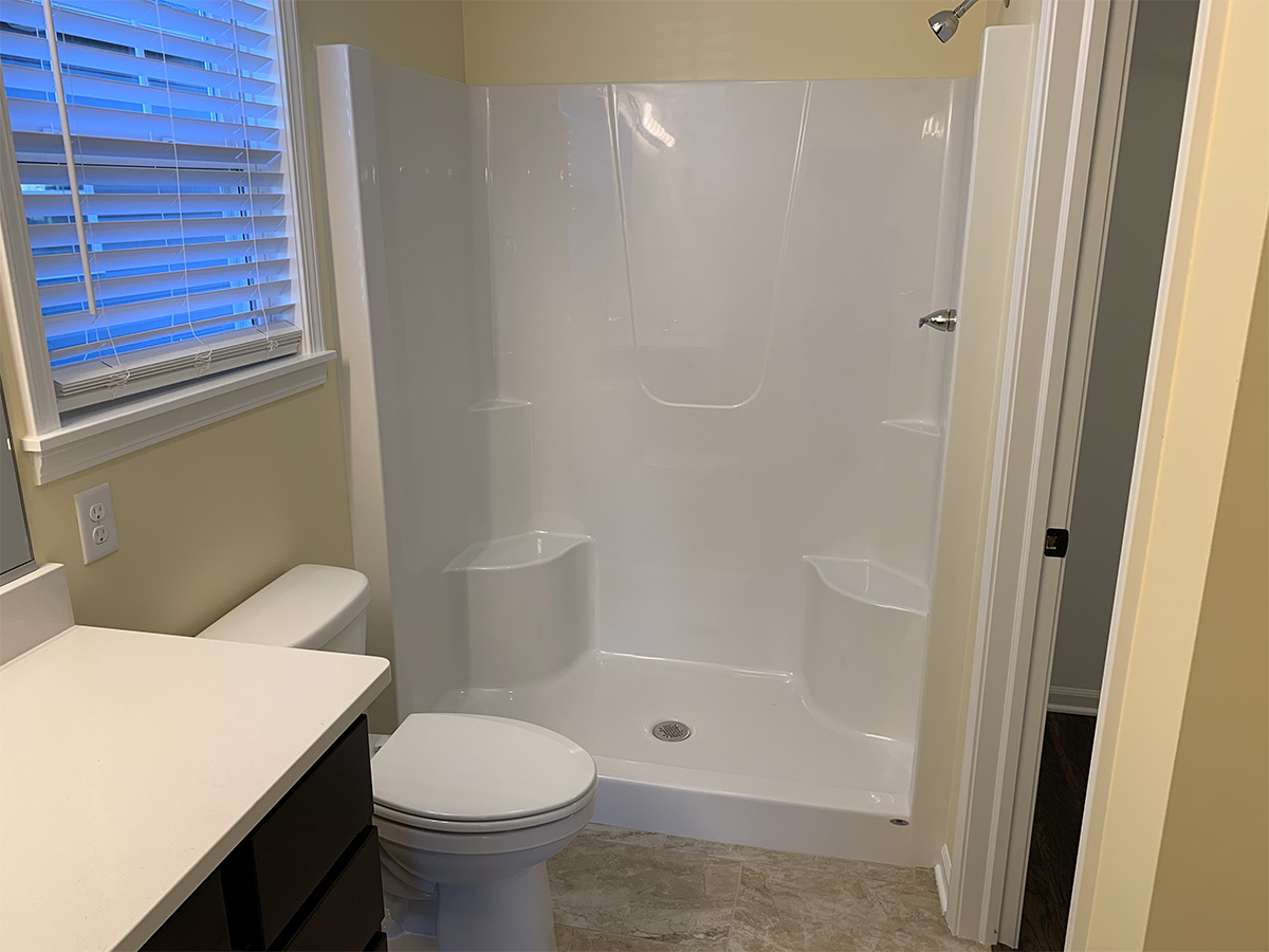 Master bathroom with toilet and shower