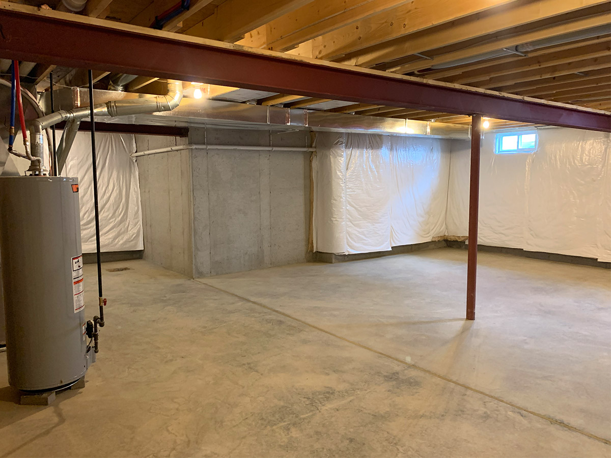 Unfinished basement with water heater