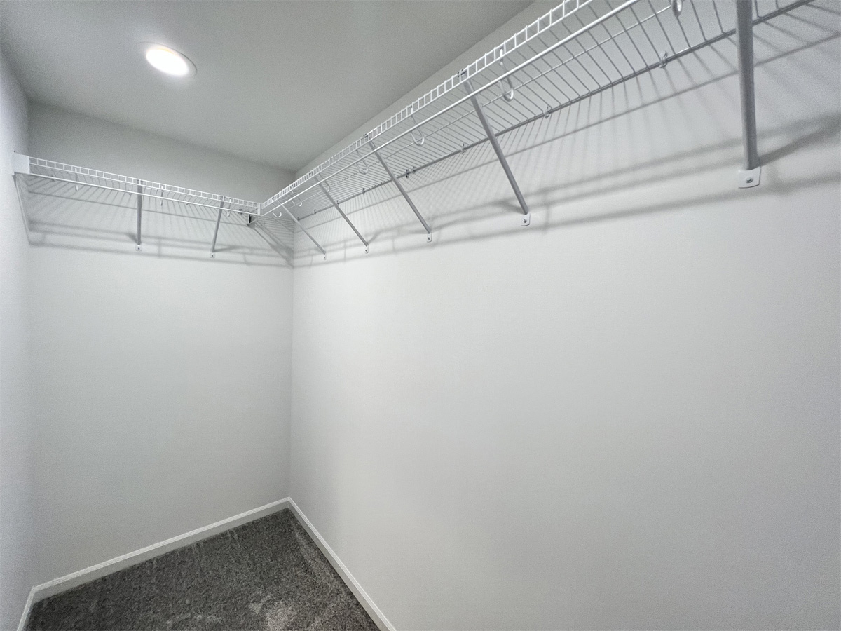 The Jefferson master bedroom closet with wire shelving