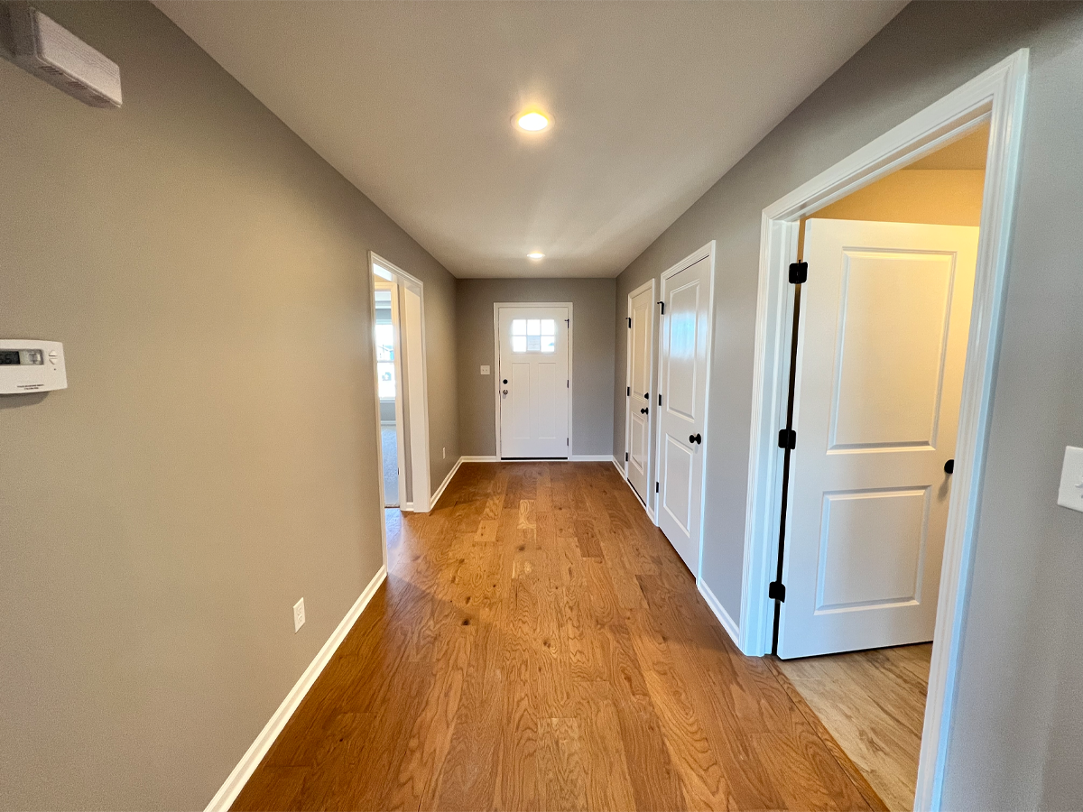 Juniper entry way with hardwood floors